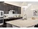 Modern kitchen features granite countertops, stainless steel appliances, and ample cabinet space at 204 Mill Chapel Rd, Chapel Hill, NC 27517
