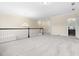Spacious loft featuring carpet, windows, chandelier and view to bathroom at 204 Mill Chapel Rd, Chapel Hill, NC 27517