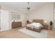 Bedroom is virtually staged to show possible furniture layout at 2111 Piney Brook Rd # 101, Raleigh, NC 27614