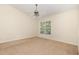 Bedroom with neutral carpet and a ceiling fan at 2111 Piney Brook Rd # 101, Raleigh, NC 27614