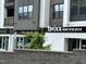 Commercial building featuring diverse storefronts, including a salon and wood-fired pizza restaurant, ideal for local residents at 2111 Piney Brook Rd # 101, Raleigh, NC 27614