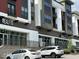 Attractive modern apartment building with commercial space, offering a mix of residential and business opportunities at 2111 Piney Brook Rd # 101, Raleigh, NC 27614