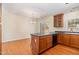 Spacious kitchen with ample counter space, cabinets, and a designated dining area at 2111 Piney Brook Rd # 101, Raleigh, NC 27614