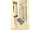 Bathroom featuring tile flooring, glass-enclosed shower, and a toilet at 212 Placid Pond Dr, Broadway, NC 27505