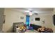 Bedroom features a crib, dresser, curtains, and kid-friendly decor at 212 Placid Pond Dr, Broadway, NC 27505