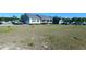 A single-story home with an attached garage and front yard at 212 Placid Pond Dr, Broadway, NC 27505