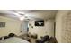 Spacious bedroom with natural light and ceiling fan with TV, perfect for relaxation and entertainment at 212 Placid Pond Dr, Broadway, NC 27505
