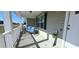 Welcoming front porch with comfortable seating and a decorative 