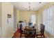 Bright dining room with hardwood floors and chandelier, ideal for intimate meals and gatherings at 2308 Buffalo Way, Durham, NC 27704