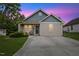 Charming single-story home featuring a well-maintained lawn and inviting front entrance, perfect for a cozy lifestyle at 2308 Buffalo Way, Durham, NC 27704