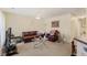 Comfortable living room with leather furniture, a ceiling fan, and ample space for relaxation at 2308 Buffalo Way, Durham, NC 27704