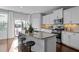 Updated kitchen with granite counters, a large island, and seating for three at 2316 Apex Peakway, Apex, NC 27502