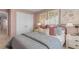 Nicely appointed bedroom with elegant wall art and plush bedding at 239 Moyer Dr, Graham, NC 27253