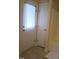 Bathroom shows a tub and two doors at 243 Nortwick Rd, Rolesville, NC 27571