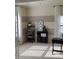 Bright bedroom with neutral walls, carpet, stylish shelving and desk area with white curtains at 243 Nortwick Rd, Rolesville, NC 27571