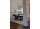 Traditional dining room boasting a modern light fixture, wood floors, and a neutral color scheme at 243 Nortwick Rd, Rolesville, NC 27571