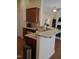 Kitchen boasts granite countertops, tiled backsplash and breakfast bar, perfect for casual dining at 243 Nortwick Rd, Rolesville, NC 27571