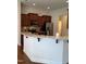 Bright kitchen has granite counters, stainless appliances and rich, wood cabinets at 243 Nortwick Rd, Rolesville, NC 27571