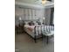 Main bedroom features stylish decor, lamps, and a cozy ambiance at 243 Nortwick Rd, Rolesville, NC 27571