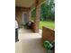 Inviting covered patio offering comfortable seating and serene outdoor views at 243 Nortwick Rd, Rolesville, NC 27571