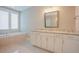 Bright bathroom with soaking tub, double vanity, and modern fixtures at 2737 Willow Rock Ln, Apex, NC 27523