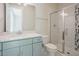 Stylish bathroom featuring double vanity, modern shower, and mosaic tile accents at 2737 Willow Rock Ln, Apex, NC 27523