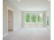 Spacious bonus room with large windows bringing in lots of natural light at 2737 Willow Rock Ln, Apex, NC 27523