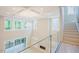 Foyer showcasing staircase and a glass-enclosed overlook area at 2737 Willow Rock Ln, Apex, NC 27523