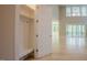 Convenient mudroom with built-in shelving, bench, and coat hooks near the entry at 2737 Willow Rock Ln, Apex, NC 27523