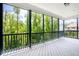 Covered porch featuring wood railings and lots of shade at 2737 Willow Rock Ln, Apex, NC 27523