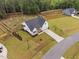 Aerial view of the home highlighting the landscaping and the surrounding neighborhood at 297 Sexton Ln, Wendell, NC 27591