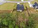 Areal view featuring a backyard patio area, grass, and privacy fence at 297 Sexton Ln, Wendell, NC 27591
