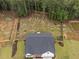 Expansive backyard featuring a newly built home, privacy fence, and natural surroundings at 297 Sexton Ln, Wendell, NC 27591