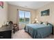 Cozy bedroom featuring a comfortable bed, window views, and tasteful decor at 297 Sexton Ln, Wendell, NC 27591