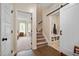 Hallway shows an open door to a bedroom and a sliding door to a closet at 297 Sexton Ln, Wendell, NC 27591