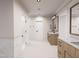Modern bathroom featuring a glass shower, stylish vanity, and ample lighting for a clean and refreshing space at 300 Westerman Pl, Smithfield, NC 27577