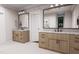 Elegant bathroom with double vanities, marble countertops, and modern fixtures, offering a spa-like experience at 300 Westerman Pl, Smithfield, NC 27577