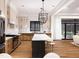 Well-designed kitchen with an island, stainless steel appliances, and open access to living area at 300 Westerman Pl, Smithfield, NC 27577
