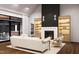 Cozy living room with a fireplace, built-in bookshelves, and comfortable seating at 300 Westerman Pl, Smithfield, NC 27577