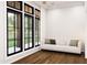 Spacious living room with modern sofa, hardwood floors, and large windows offering natural light and outdoor views at 300 Westerman Pl, Smithfield, NC 27577