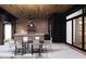 Stylish outdoor kitchen with a built-in grill, bar seating, and an adjacent dining area for entertaining at 300 Westerman Pl, Smithfield, NC 27577
