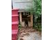 Exterior with covered electrical outlets, brick foundation, and surrounding foliage at 3125 Stanford Dr, Durham, NC 27707