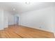 Spacious living room with hardwood floors, neutral walls, and ample natural light at 3125 Stanford Dr, Durham, NC 27707