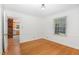 Bright living room features beautiful hardwood floors and plenty of natural light from the windows at 3125 Stanford Dr, Durham, NC 27707