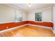 Comfortable space featuring hardwood floors, bright windows, and tasteful wall accents at 3125 Stanford Dr, Durham, NC 27707