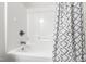 Bathroom with shower and patterned shower curtain at 3359 Denise St, Durham, NC 27704