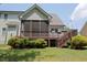Lovely home featuring a screened-in porch and wooden deck, perfect for outdoor enjoyment at 337 Shadowdale Ln, Rolesville, NC 27571