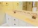 Bathroom vanity featuring dual sinks, granite countertop, and mosaic tile backsplash at 337 Shadowdale Ln, Rolesville, NC 27571