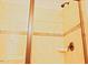 Tiled shower with glass door and shower head offers a modern and clean bathroom space at 337 Shadowdale Ln, Rolesville, NC 27571