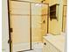 Bathroom with a tiled shower that features glass doors, a vanity, and a decorative shelf at 337 Shadowdale Ln, Rolesville, NC 27571
